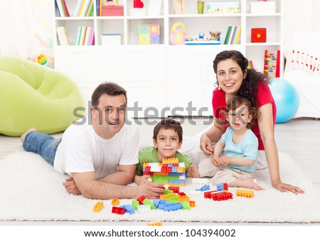 Parents And Children Playing Together